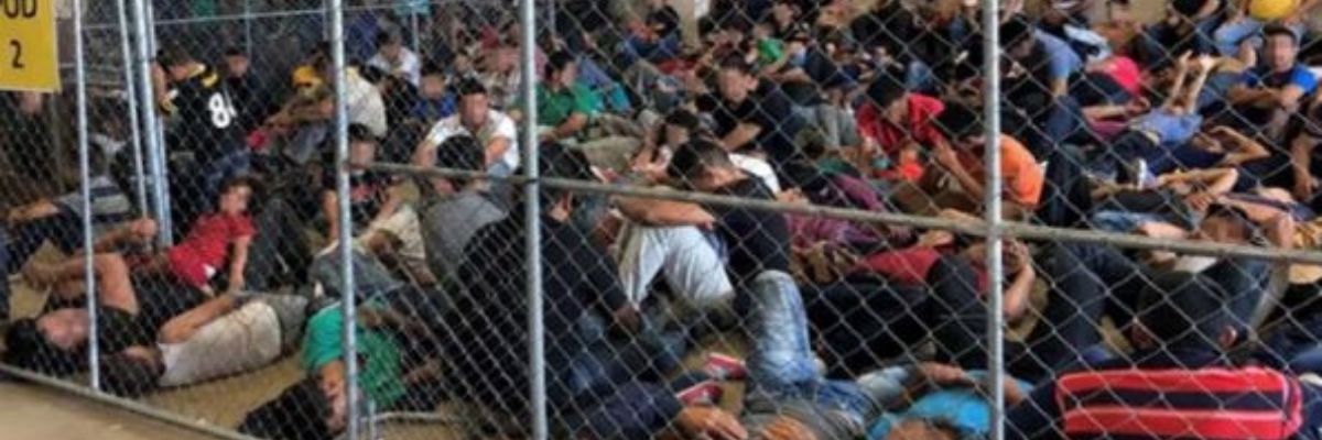 An overcrowded, fenced area holds families at a Border Patrol station in McAllen, TX, on 10 June 2019 (Thomas Cizauskas).