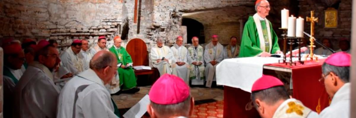 priests saying mass in the catacombs