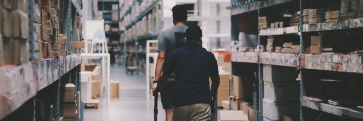 Two men shopping in a big-box store